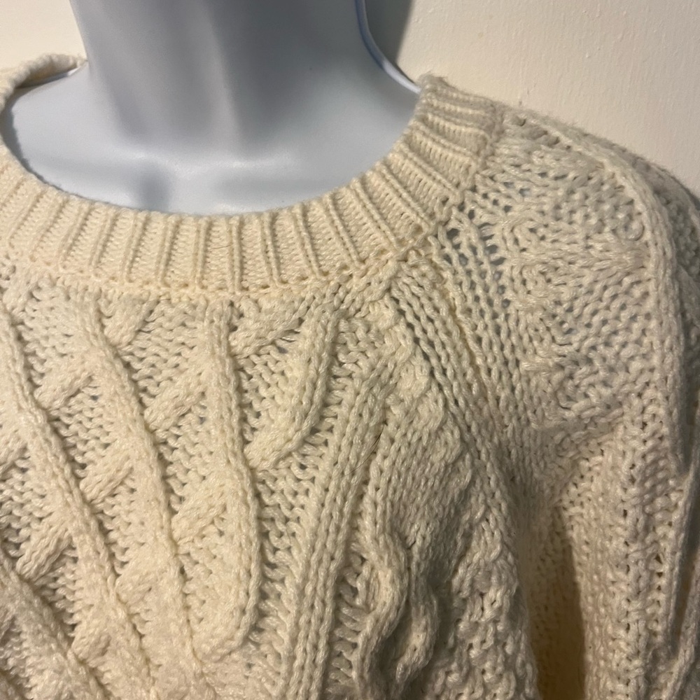 Hem & Thread  Size small Cream Cable Knit Sweater with tassels on bottom.